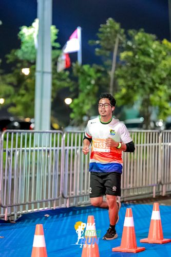 Race photo from PIK NITE RUN 2025