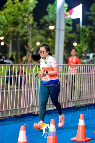 Race photo from PIK NITE RUN 2025