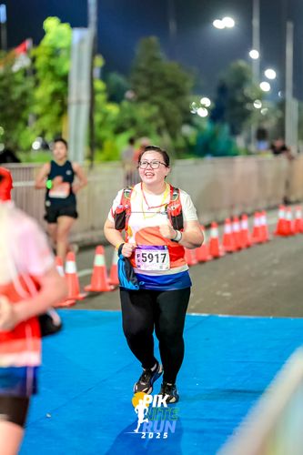 Race photo from PIK NITE RUN 2025