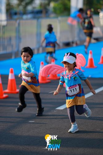 Race photo from PIK NITE RUN 2025