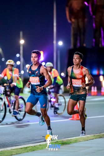 Race photo from PIK NITE RUN 2025