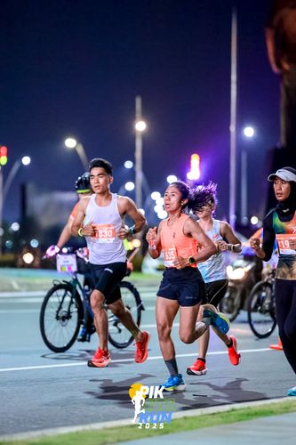 Race photo from PIK NITE RUN 2025