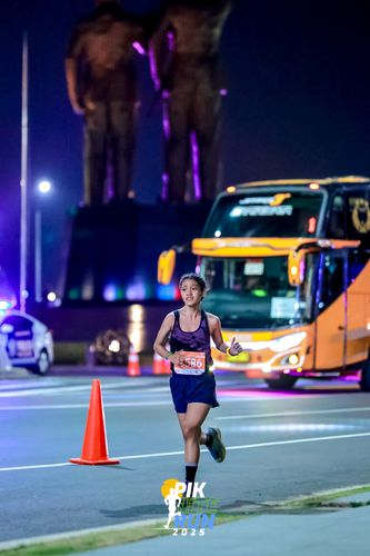 Race photo from PIK NITE RUN 2025