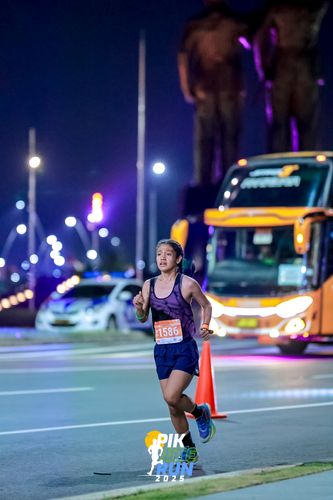 Race photo from PIK NITE RUN 2025