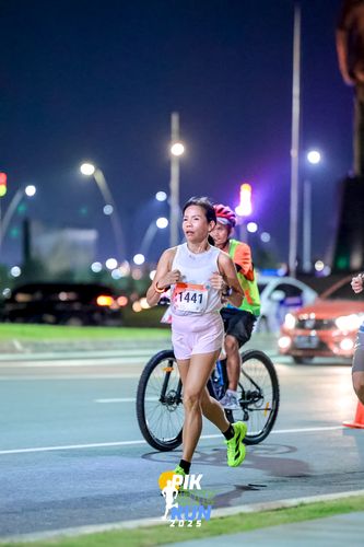 Race photo from PIK NITE RUN 2025