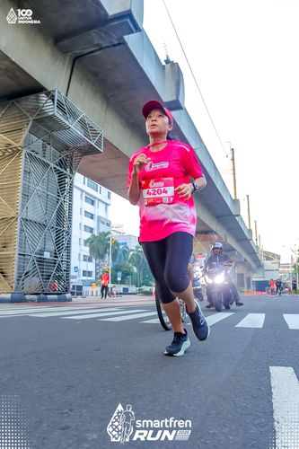 Race photo from Smartfren Run 2025 