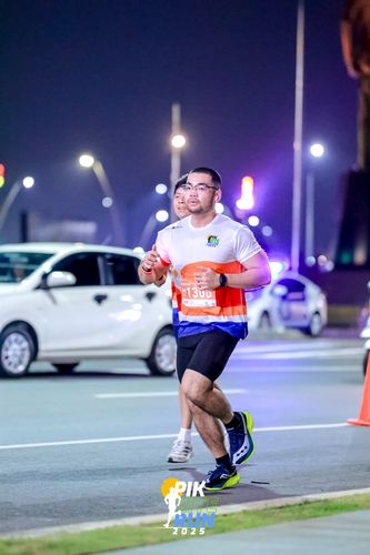 Race photo from PIK NITE RUN 2025