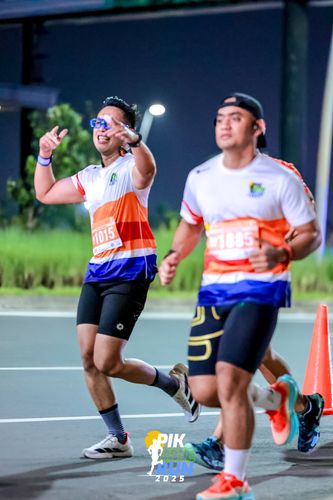 Race photo from PIK NITE RUN 2025