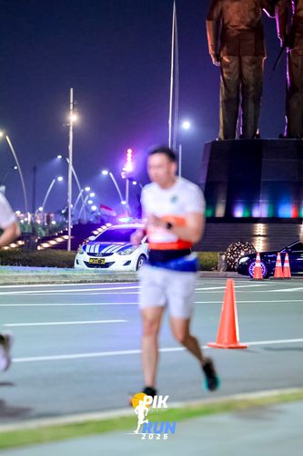 Race photo from PIK NITE RUN 2025