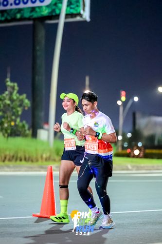 Race photo from PIK NITE RUN 2025