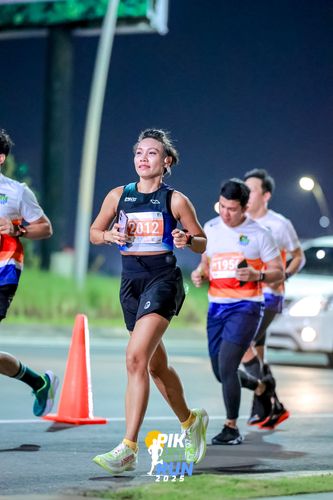 Race photo from PIK NITE RUN 2025