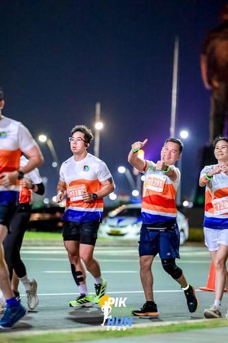 Race photo from PIK NITE RUN 2025