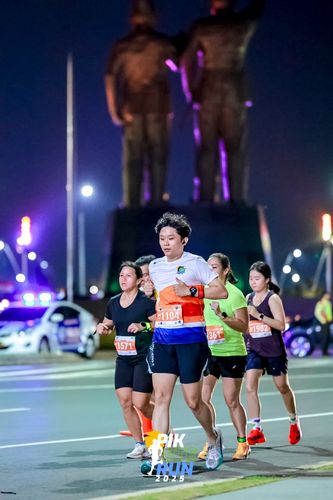 Race photo from PIK NITE RUN 2025