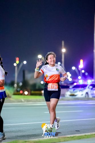 Race photo from PIK NITE RUN 2025