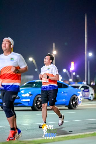 Race photo from PIK NITE RUN 2025