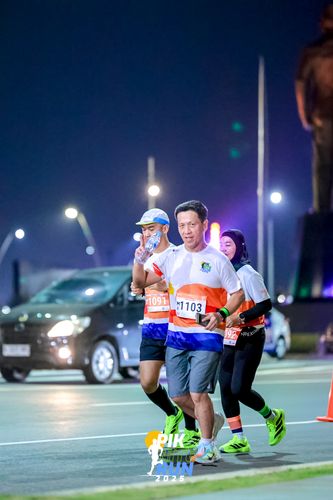 Race photo from PIK NITE RUN 2025