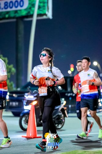 Race photo from PIK NITE RUN 2025