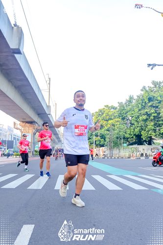Race photo from Smartfren Run 2025 