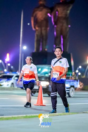 Race photo from PIK NITE RUN 2025
