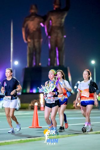 Race photo from PIK NITE RUN 2025