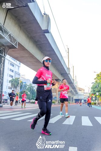 Race photo from Smartfren Run 2025 