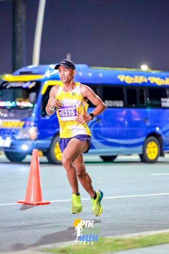 Race photo from PIK NITE RUN 2025