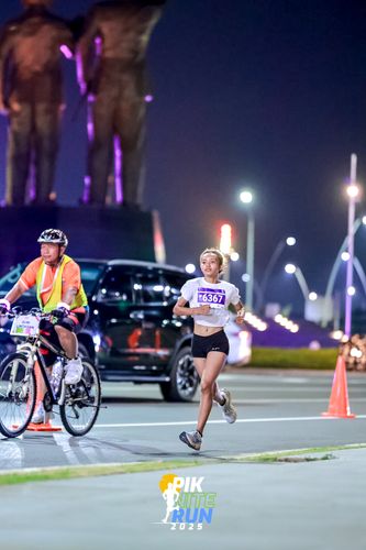 Race photo from PIK NITE RUN 2025