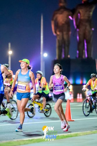 Race photo from PIK NITE RUN 2025