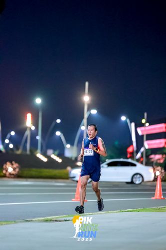 Race photo from PIK NITE RUN 2025
