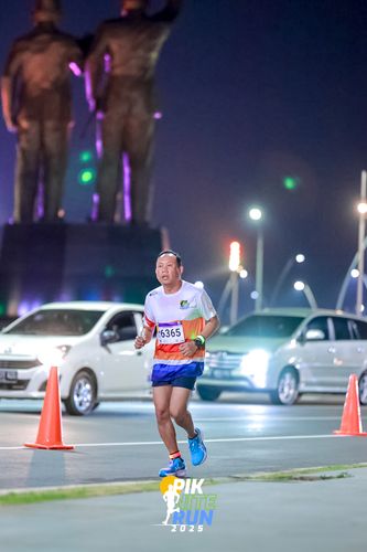 Race photo from PIK NITE RUN 2025