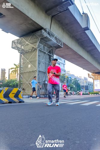 Race photo from Smartfren Run 2025 