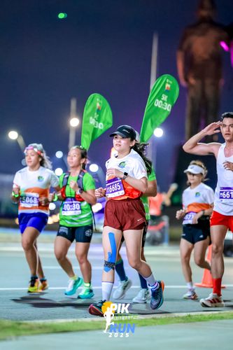 Race photo from PIK NITE RUN 2025