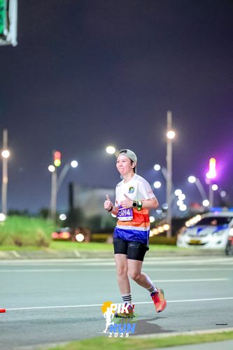 Race photo from PIK NITE RUN 2025