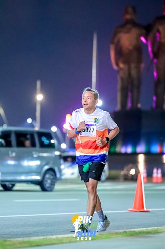 Race photo from PIK NITE RUN 2025
