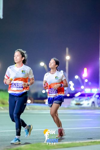 Race photo from PIK NITE RUN 2025