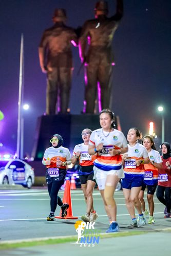 Race photo from PIK NITE RUN 2025