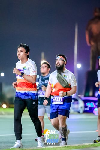 Race photo from PIK NITE RUN 2025