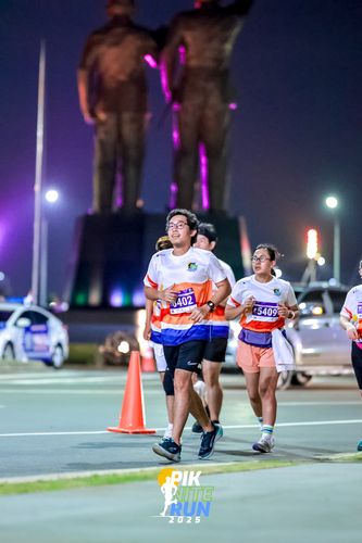 Race photo from PIK NITE RUN 2025