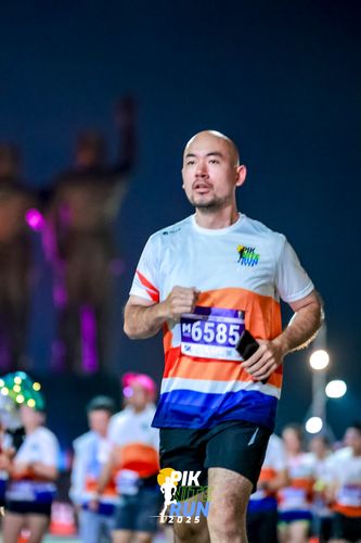 Race photo from PIK NITE RUN 2025
