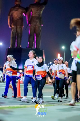 Race photo from PIK NITE RUN 2025