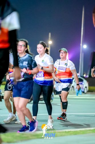 Race photo from PIK NITE RUN 2025
