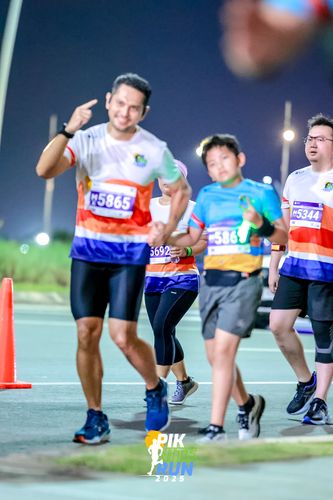 Race photo from PIK NITE RUN 2025