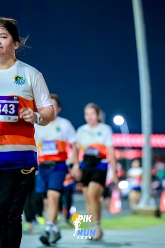 Race photo from PIK NITE RUN 2025