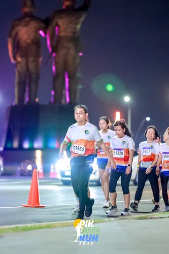 Race photo from PIK NITE RUN 2025