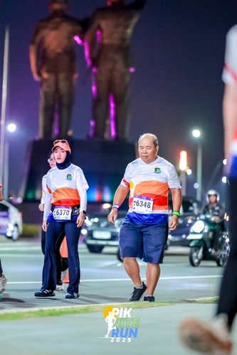 Race photo from PIK NITE RUN 2025