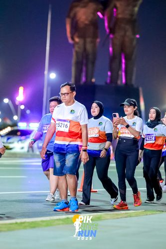 Race photo from PIK NITE RUN 2025
