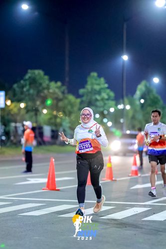 Race photo from PIK NITE RUN 2025
