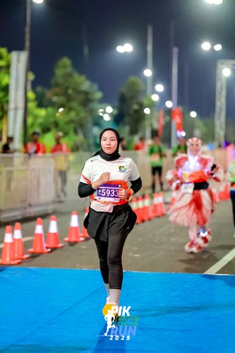 Race photo from PIK NITE RUN 2025