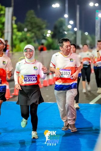 Race photo from PIK NITE RUN 2025