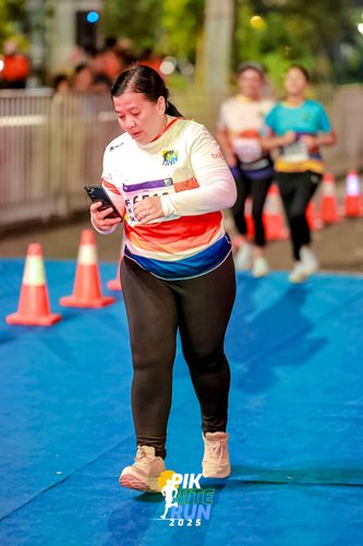 Race photo from PIK NITE RUN 2025